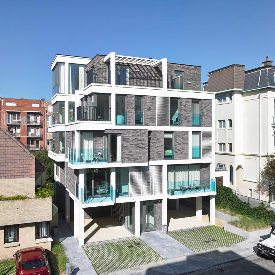 Bright apartment nearby the beach in De Haan Buitenkant foto